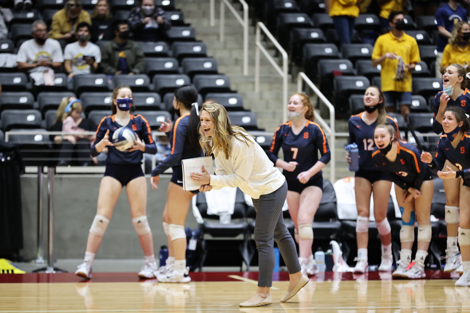 Seven Lakes coach Amy Cataline cheers on her players during the team's Class 6A state final game against Klein on Dec. 12 at the Culwell Center in Garland.